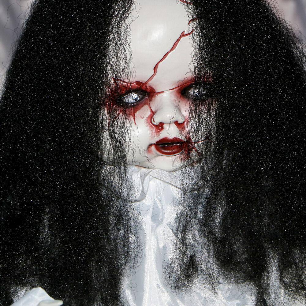 Haunted Hill Farm 24 in. Battery Operated Poseable Haunted Jumping Doll with Red LED Eyes Halloween Prop