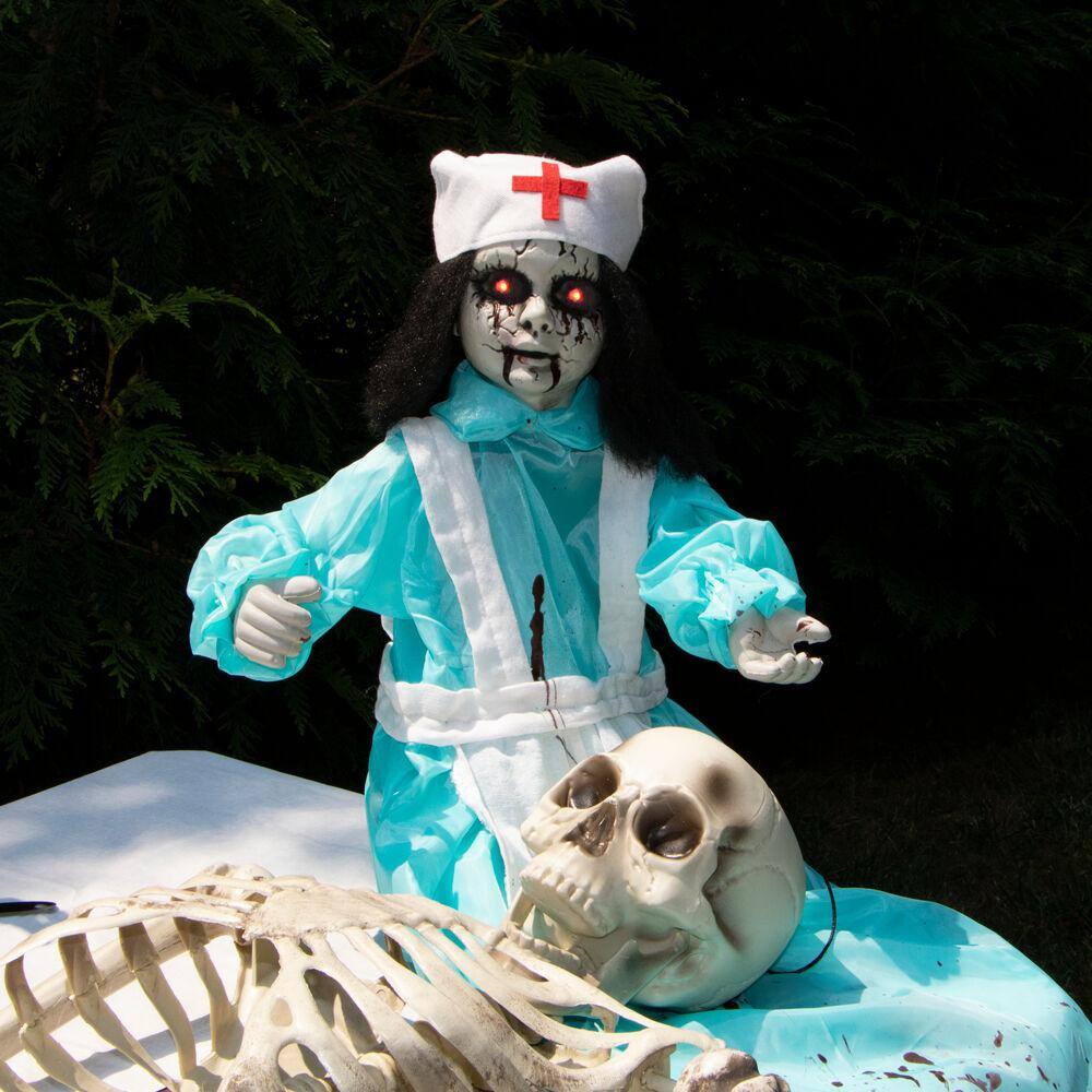 Haunted Hill Farm 21.5 in. Battery Operated Poseable Animatronic Nurse with Red LED Eyes Halloween Prop