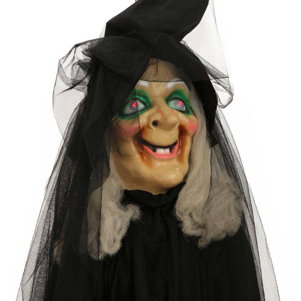 Haunted Hill Farm  78 in. Battery Operated Witch On A Broom with Red LED Eyes Halloween Prop