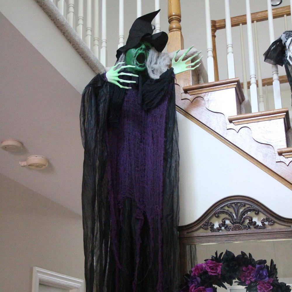 Haunted Hill Farm  70 in. Battery Operated Poseable Hanging Witch with Red LED Eyes Halloween Prop