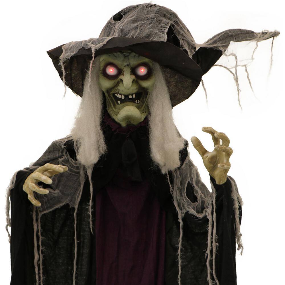 Haunted Hill Farm 83 in. Battery Operated Poseable Standing Witch with Red LED Eyes Halloween Prop